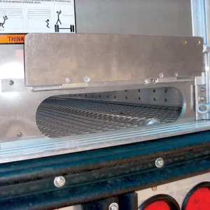 Rounded opening near floor of trailer for draining