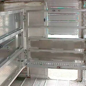 Split-lid, L-shaped panel inside trailer