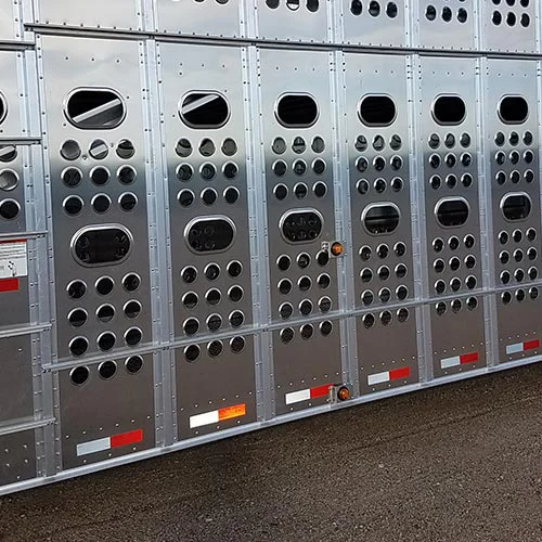 A closeup interior view of the hole punches on Merritt livestock trailers