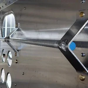 A metal tie rail installed inside a gooseneck trailer