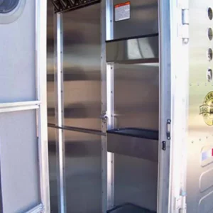 Custom shelving inside the tack area of a lariat trailer