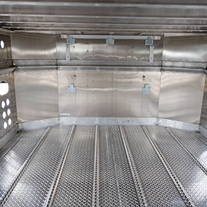 A closeup interior view of the hole punches on Merritt livestock trailers